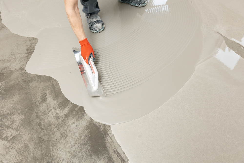 screed,concrete,with,self,leveling,cement,mortar,for,floors.,master