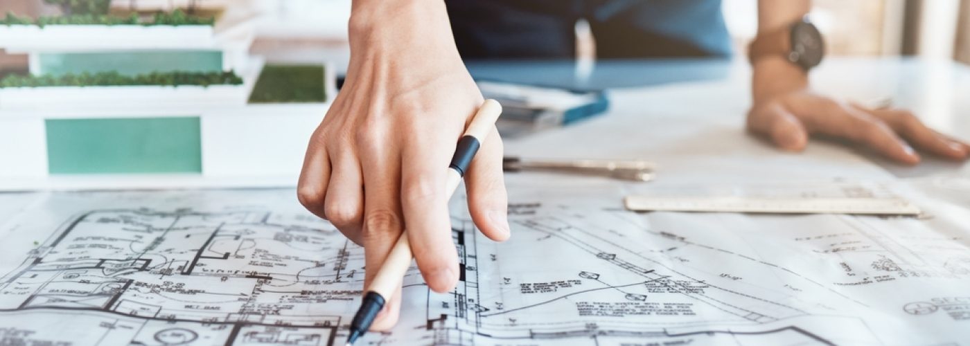 architect,,hand,and,blueprint,on,paper,in,office,with,property